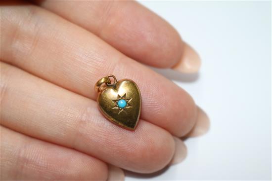 An Edwardian gold openwork pendant set amethyst and pearl, a peridot set pendant and a 15ct gold and turquoise heart pendant